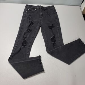 Aero high rise faded black ripped raw hem skinny jeans women's size 4